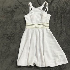 White textured halter dress with cut out mid area.